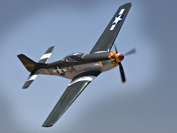 The second P-51 does a fly-by